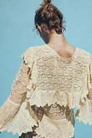 BLOUSE EN MAILLE POINTELLE À VOLANTS