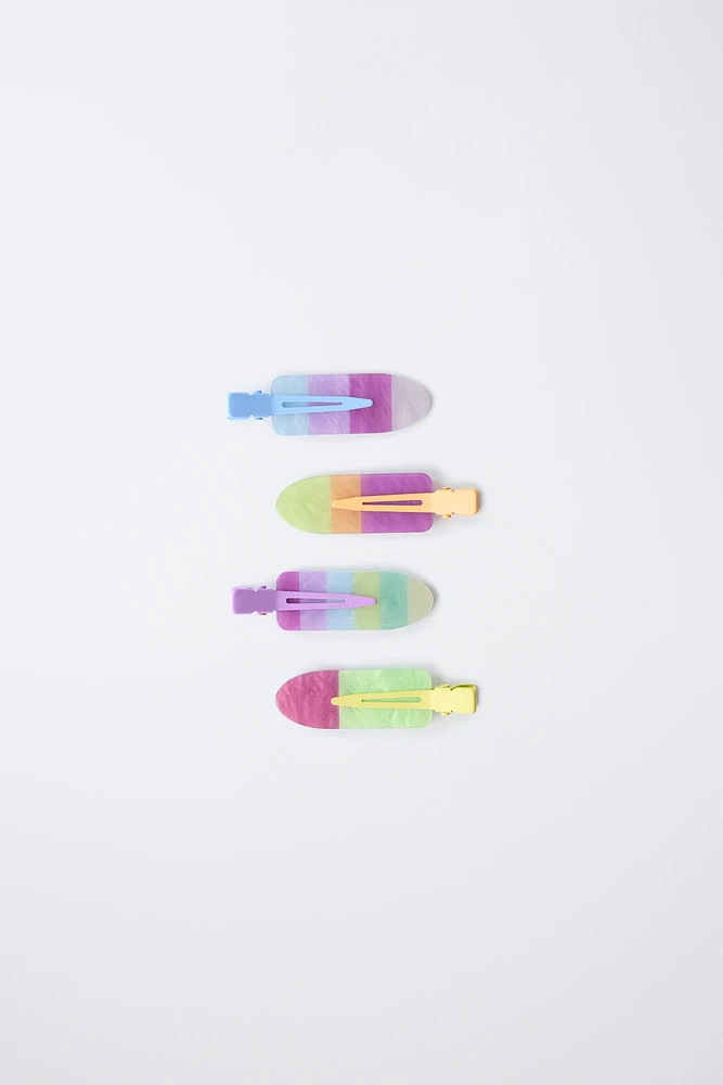 LOT DE QUATRE CLIPS COULEURS