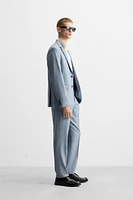 TEXTURED SUIT PANTS