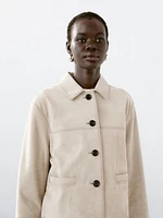 Veste courte à surpiqûres en cuir finition daim