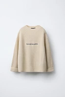 EMBROIDERED TEXT KNIT SWEATER