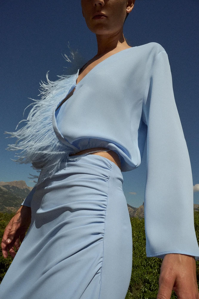 FEATHER WRAP BLOUSE