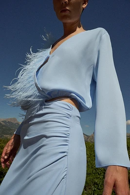 FEATHER WRAP BLOUSE
