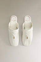MULES CROISÉES CUIR