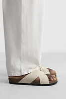 CROSS-STRAP LEATHER SANDALS