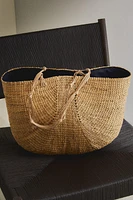 BRAIDED STRAW BAG WITH KNOTS