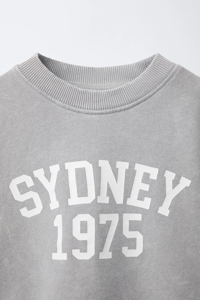 WASHED EFFECT TEXT SWEATSHIRT