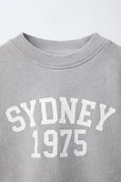 WASHED EFFECT TEXT SWEATSHIRT