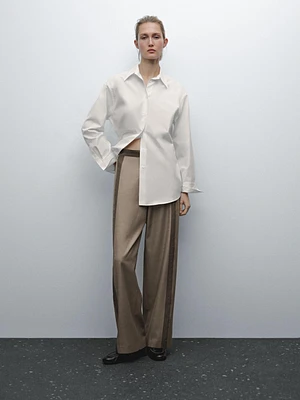 Straight-leg trousers with fastening detail