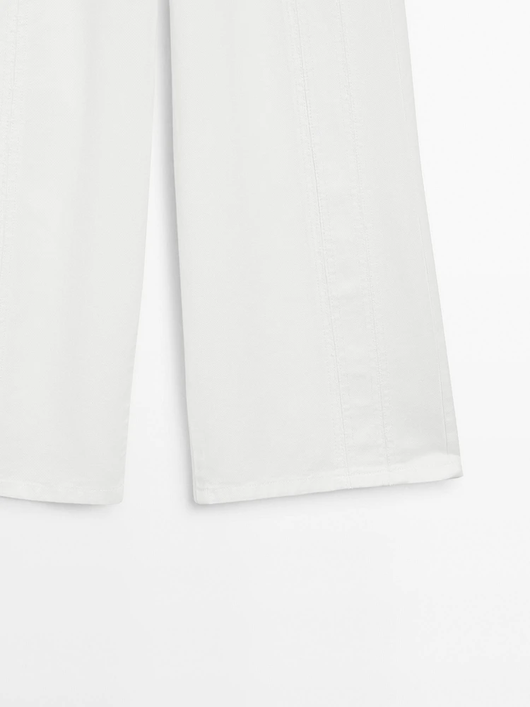 Jean wide leg taille haute avec découpes