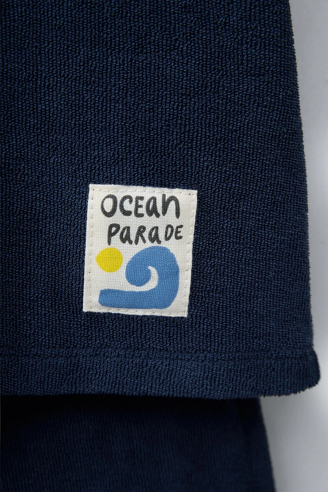ENSEMBLE JOGGING POLO ET BERMUDA ÉPONGE ÉTIQUETTE