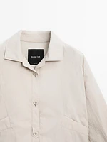 Bomber jacket with seams and gathering