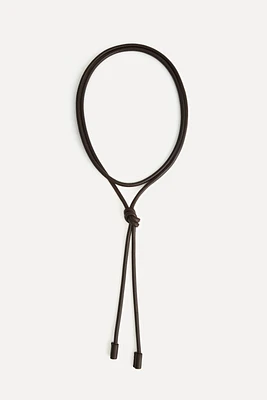 CEINTURE CIRCULAIRE EN CUIR 50E ANNIVERSAIRE