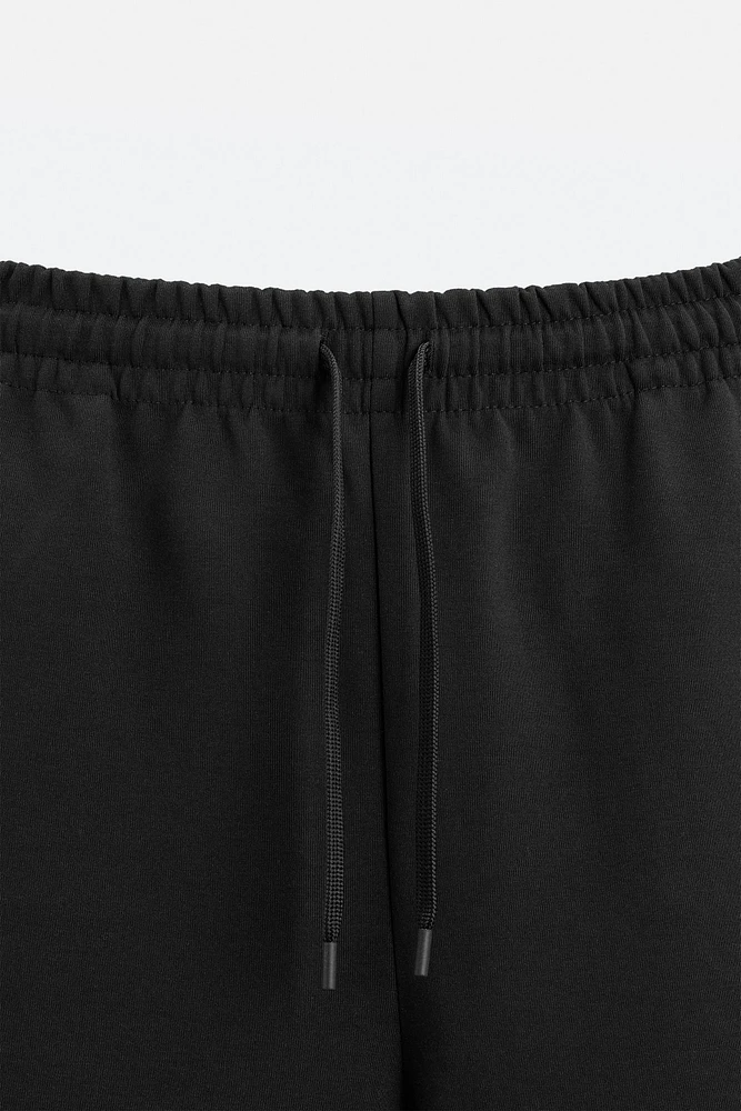 INTERLOCK STRUCTURED SHORTS