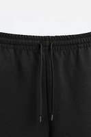 INTERLOCK STRUCTURED SHORTS