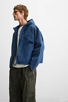 BLOUSON RELAXED FIT DÉLAVAGE PLISSÉ