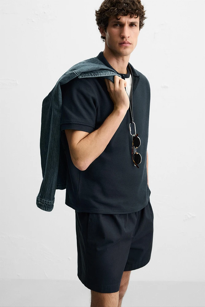 QUARTER ZIP POLO