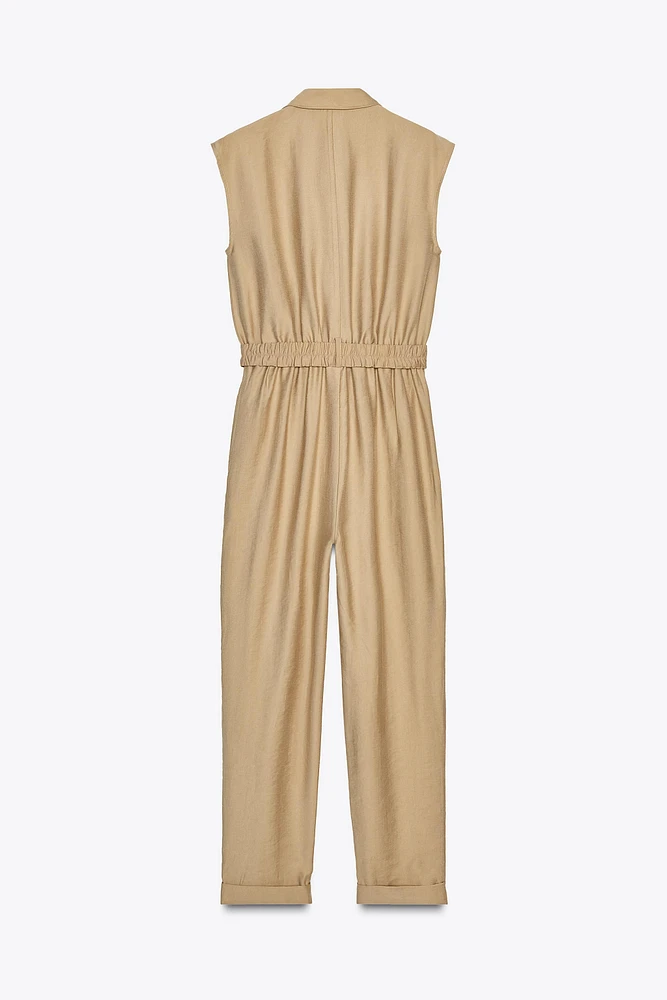 SLEEVELESS BELTED JUMPSUIT