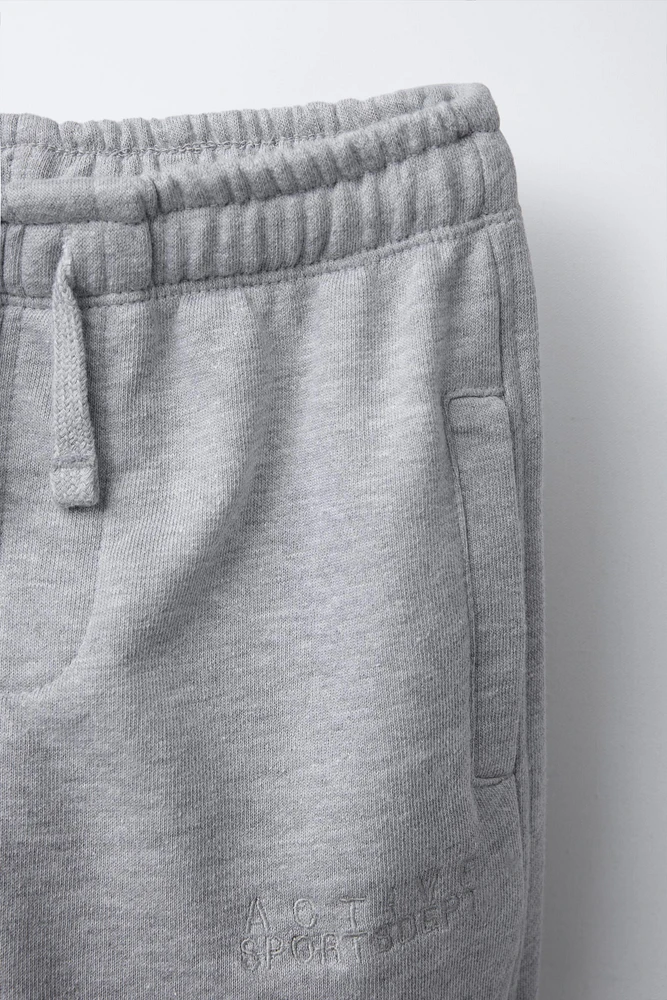 EMBROIDERED TEXT JOGGER PANTS