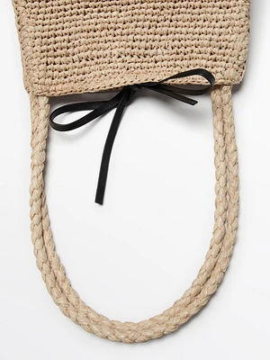 Natural raffia bucket bag