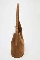 SAC SEAU SOFT ASYMÉTRIQUE EN CROÛTE DE CUIR