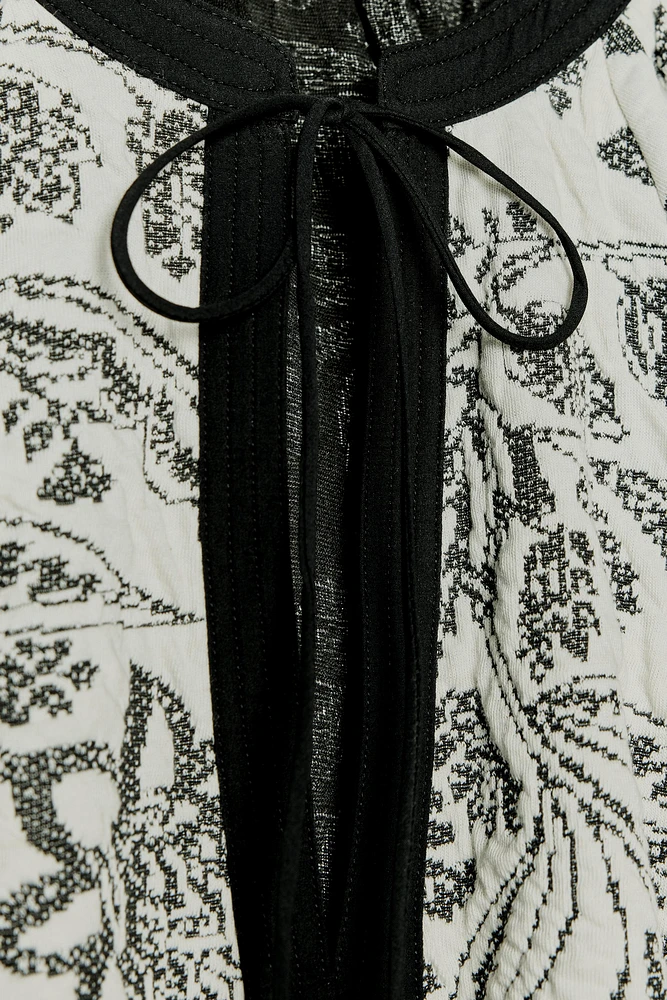 BELTED JACQUARD DRESS