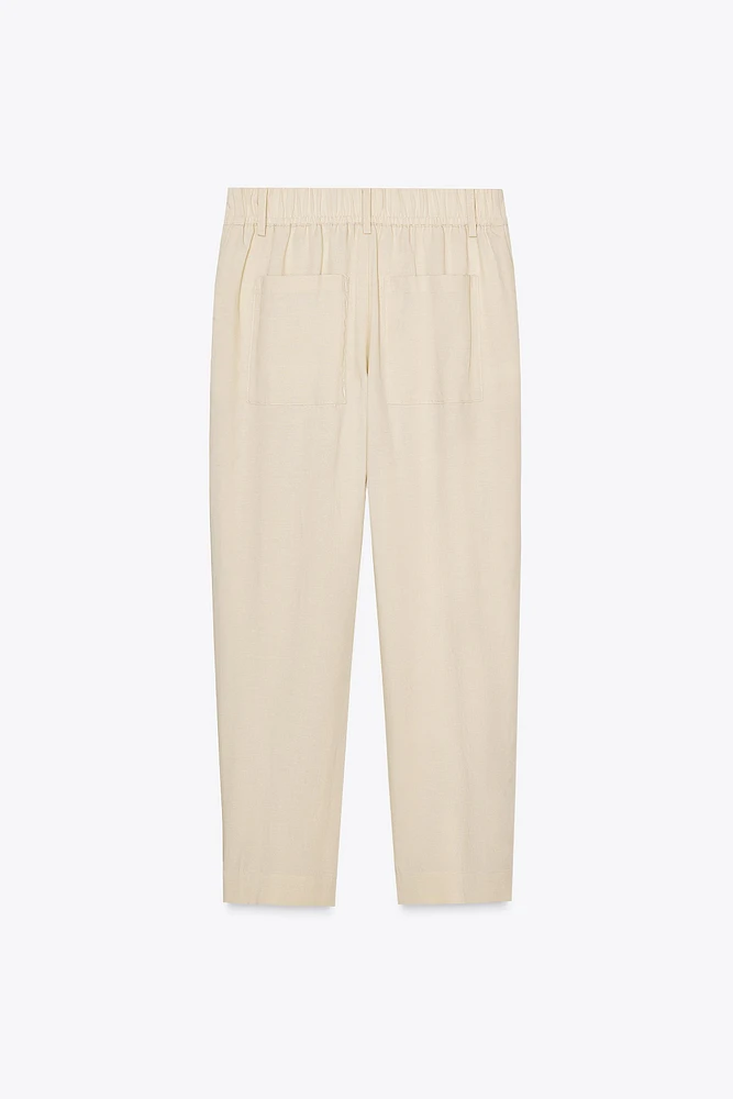 PANTALON À PINCES ET TAILLE ÉLASTIQUE