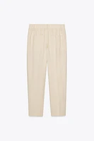 PANTALON À PINCES ET TAILLE ÉLASTIQUE