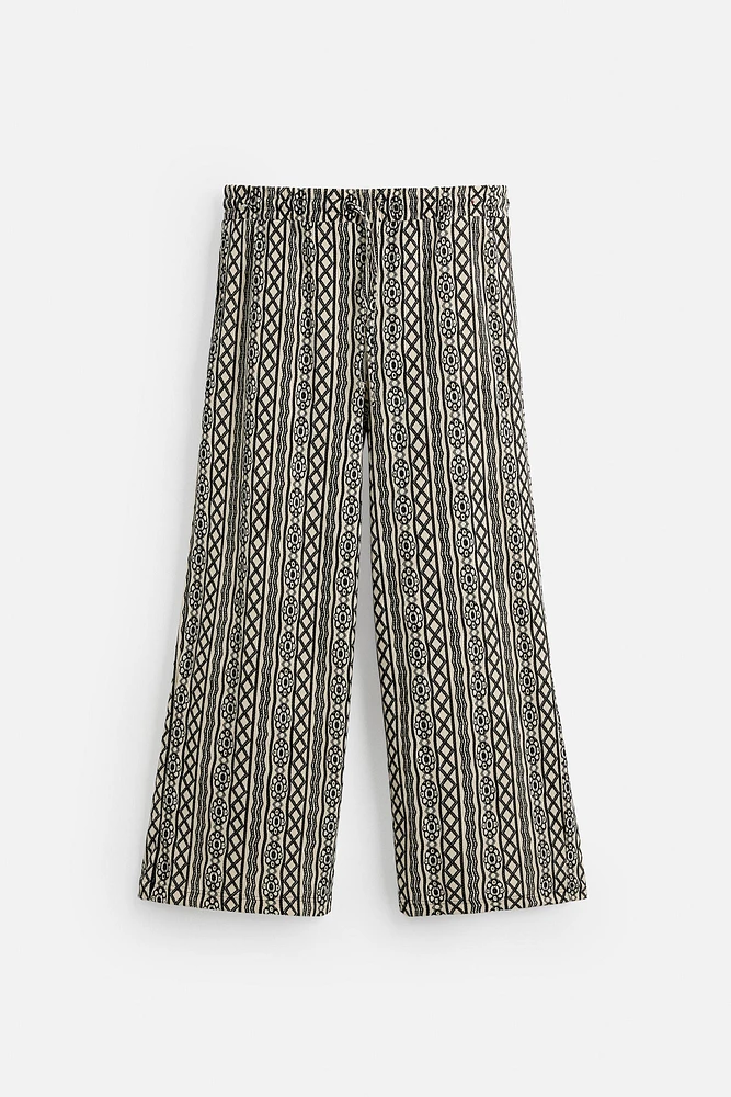 PERFORATED JACQUARD RELAXED FIT PANTS