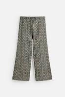 PERFORATED JACQUARD RELAXED FIT PANTS