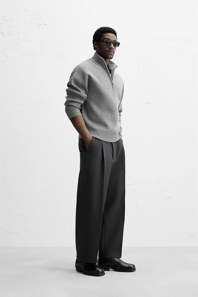 QUARTER ZIP SWEATER