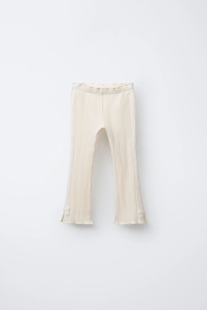 SIDE STRIPE TIE FLARE PANTS
