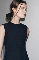 ROBE EN MAILLE QUADRILLÉE À FRANGES
