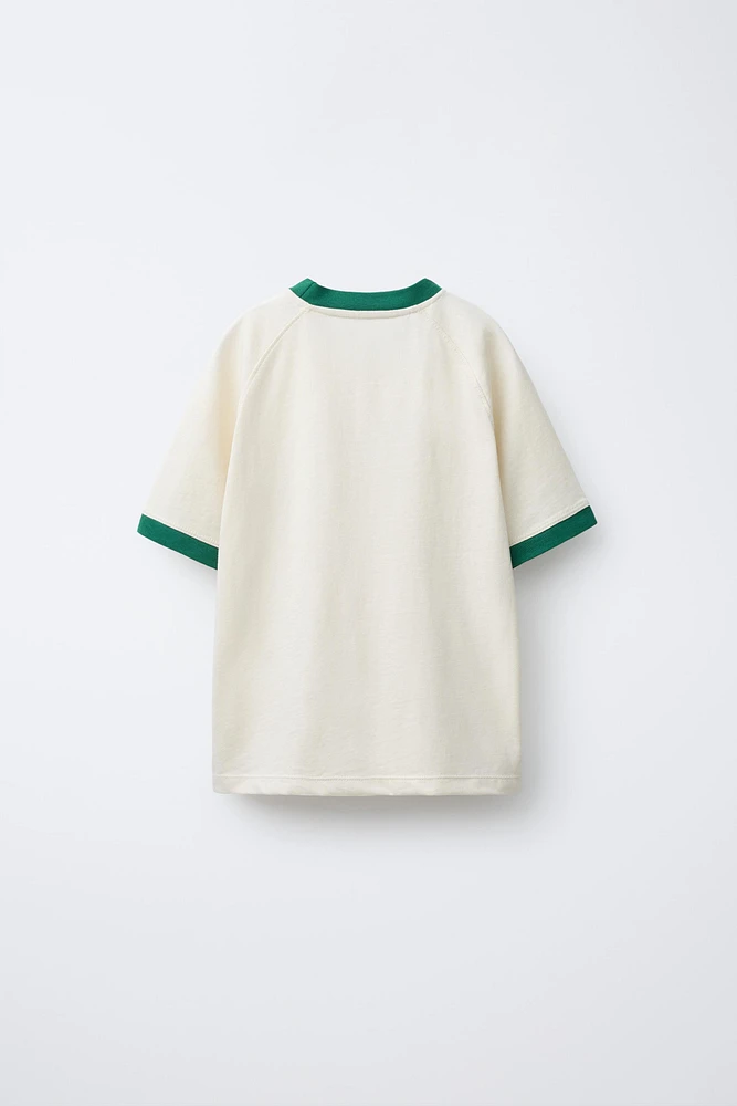 ENSEMBLE DE JOGGING T-SHIRT ET BERMUDA LISERÉS