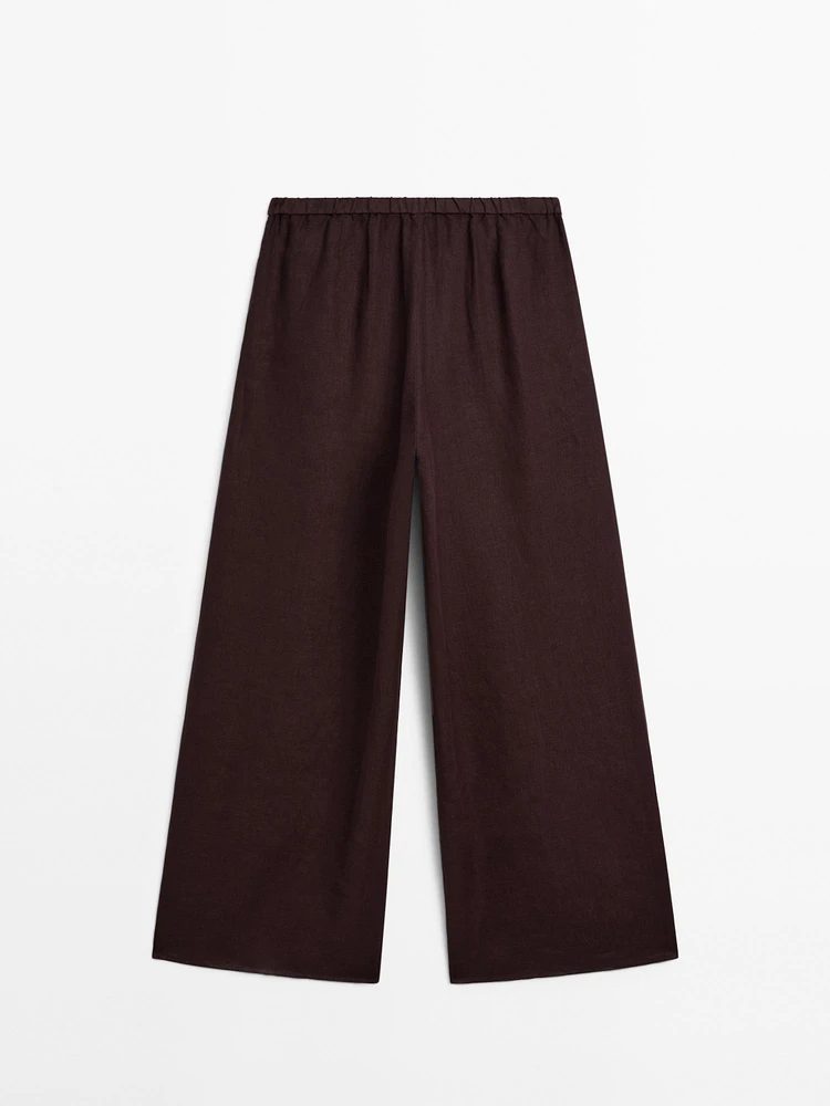 Straight-fit linen trousers with an elasticated waistband