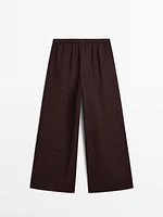 Straight-fit linen trousers with an elasticated waistband