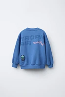 PATCH PRINT SWEATSHIRT