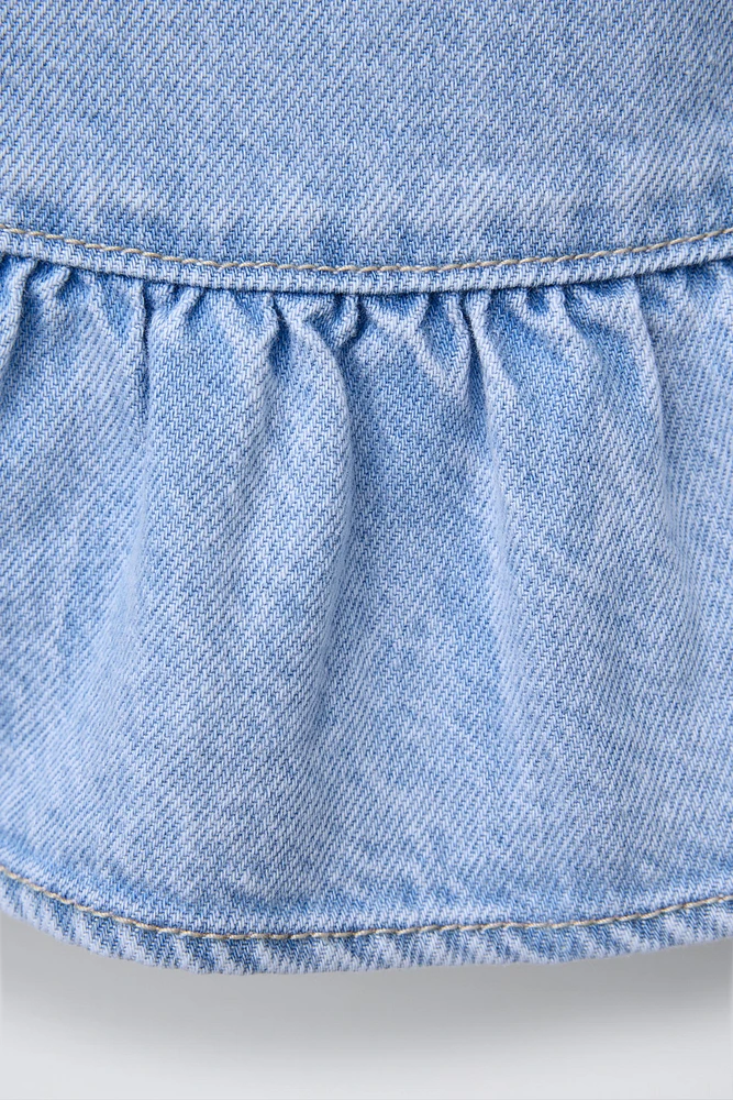 TOP EN DENIM À VOLANTS