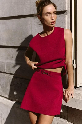 BELTED KNIT MINI SKIRT