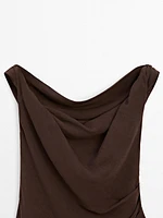 Top lin à encolure asymétrique