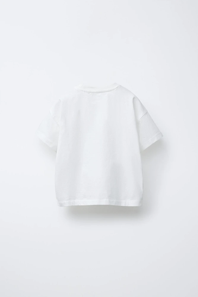 T-SHIRT WITH RAISED PRINT