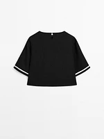 Blouse with contrast embroidery
