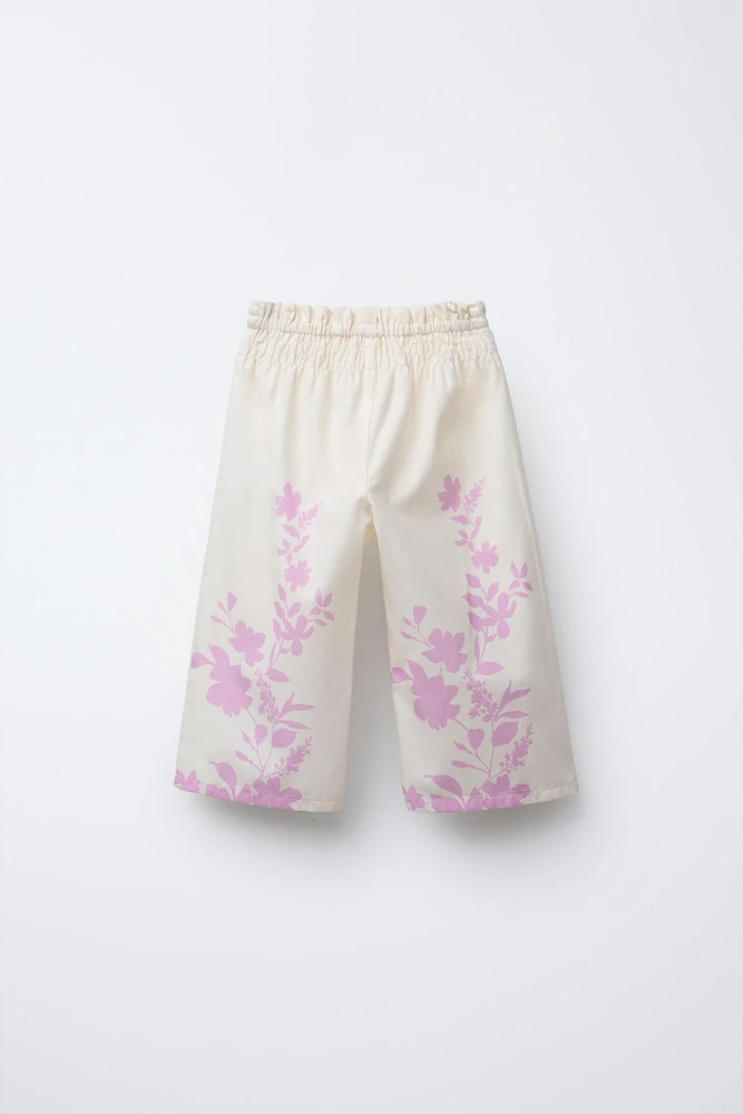 PANTALON EN POPELINE AVEC FLEURS