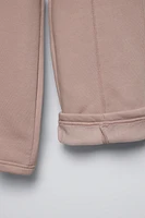 Elastic waistband pants. Adjustable Front drawstring. raised seam detail. Warm and soft interior.