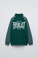 COMBINATION EVERLAST © WORLDWIDE INC. SWEATSHIRT