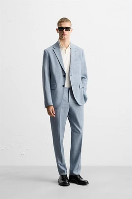 TEXTURED SUIT PANTS