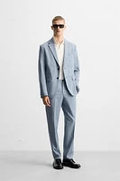 TEXTURED SUIT PANTS