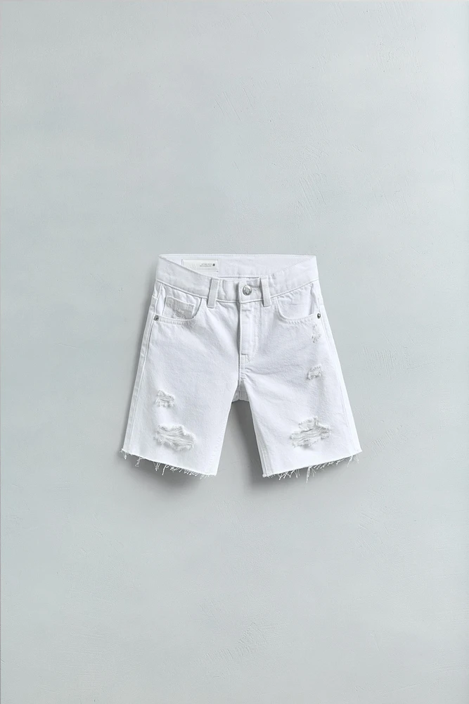 BERMUDA EN DENIM DÉCHIRÉ