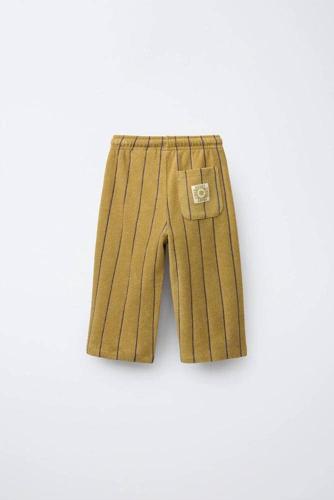 PANTALON SERVIETTE RAYÉ TISSÉ