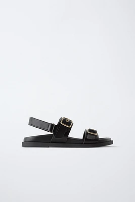 BUCKLED SANDALS